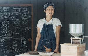 nicao chocolate founder, Naoko, in chocolate-making workshop 